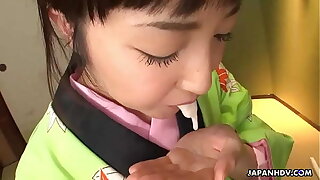 Asian bitch in a kimono sucking exposed to his erect prick